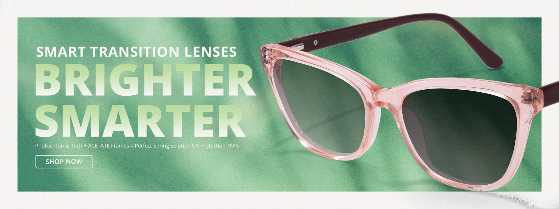 Green eyeglasses with smart transition lenses under blue sky. Brighter and smarter vision with photochromic technology and UV protection.